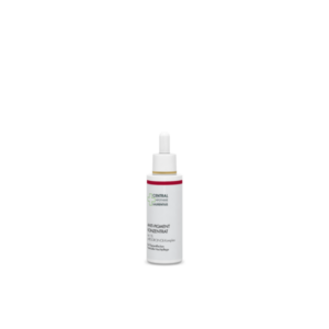 Weißes Fläschchen mit Pipette, beschriftet mit 'ANTI-PIGMENT KONZENTRAT', enthält 1% p-PSESORCINOL-Komplex.