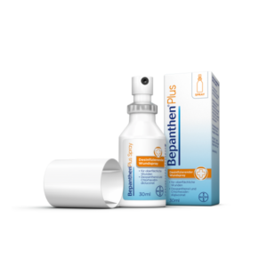 Bepanthen Plus Desinfizierendes Wundspray in einer weißen Flasche mit Sprühkopf und einer Verpackung.