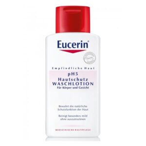 Flasche Eucerin pH5 Hautschutz Waschlotion für empfindliche Haut, mit rotem Deckel und beschreibendem Etikett.
