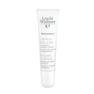 Lippenbalsam in einer weißen Tube mit Pflegehinweisen für trockene und spröde Lippen.