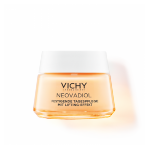 Glas-Tiegel mit festigender Tagespflege von Vichy, orangefarbener Inhalt und weißem Deckel, beschriftet mit "NEOVADIOL".