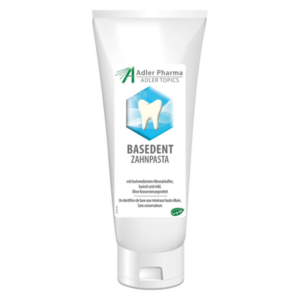 Tube mit BASIDENT Zahnpasta, ausgewiesen für ihre sanften Inhaltsstoffe ohne Konservierungsstoffe.