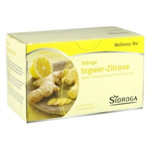 Packung mit Ingwer-Zitronen-Tee, gelber Hintergrund, frische Zutaten sichtbar, enthält 20 Aromabeutel.