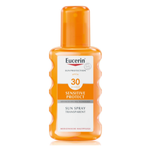 Flasche mit Eucerin Sonnen spray, LSF 30, orangefarbene Verpackung, für empfindliche Haut.