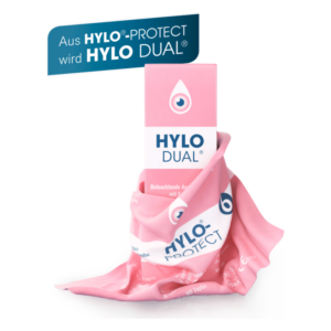 Verpackung von HYLO DUAL® in pink mit Aufschrift, umwickelt von einer pinken Tuchverpackung von HYLO-PROTECT.